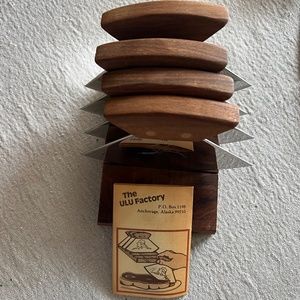 Set of four Alaska ulus ulu in wooden stand with booklet Looks  new!